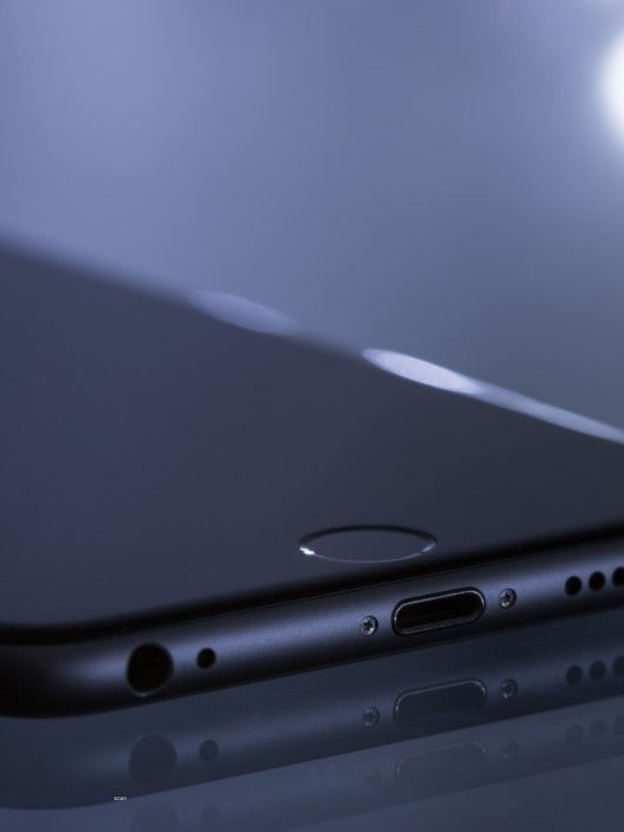 Close-up view of a black iPhone with a USB-C and a headphone jack, holding promise of what might be with all the rumors that fly for the upcoming iPhone SE 4 release date.